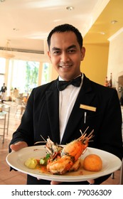 Restaurant Waiter Holding Food