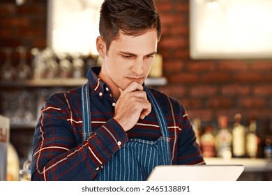 Restaurant, waiter and man with tablet, thinking and connection with internet, app and solution. Person, business owner and employee with tech, website info and service industry with online reading - Powered by Shutterstock