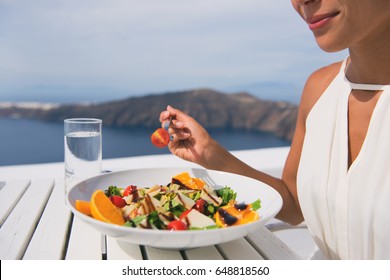 Restaurant Woman Eating Salad Luxury Europe Travel Santorini Vacation. Healthy Lifestyle People Relaxing On Greece Holidays.