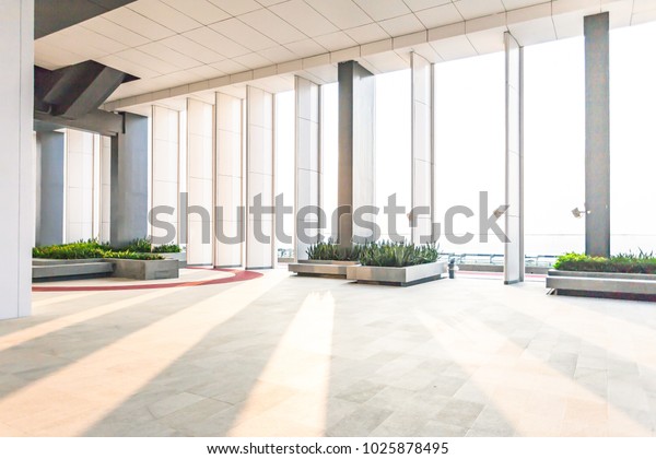 Resting area of a building, wide\
space in a building.interior of modern office, Abstract Background.\
Store, interior, office, elegant stools bright hall,\
