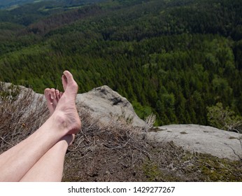 Resting Legs Within Mountain Running Trail. Hiker Watching Hilly Landscape Over Own Hairy Legs.