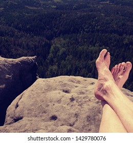 Resting Legs Within Mountain Running Trail. Hiker Watching Hilly Landscape Over Own Hairy Legs.