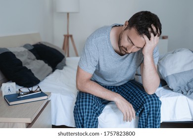 Restless Man Waking Up Early With Headache After Rough Night