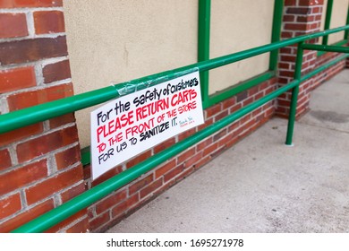 Reston, USA - April 1, 2020: Request Sign From Trader Joe's Grocery Store For Customers To Return Shopping Carts To Shop Front To Clean, For Cleaning And Sanitizing With Sanitizer Wipes With Nobody