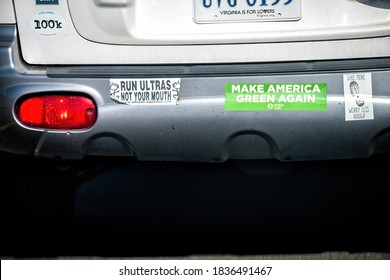 Reston, USA - August 30, 2020: Run Ultras Not Your Mouth And Make America Green Again Bumper Stickers From Sierra Club On Car