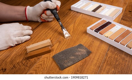 Restoration Of Laminate With Wax, Restorer Cover Up Damage To Floor.