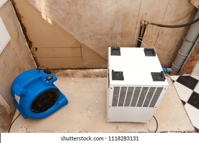 Restoration Of Water Damage With Fan And Dryer