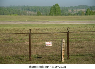 Restricted area of the airport. The inscription on the sign: Passage is prohibited.