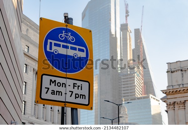 Restricted Bus\
and Bike traffic sign in a city\
center