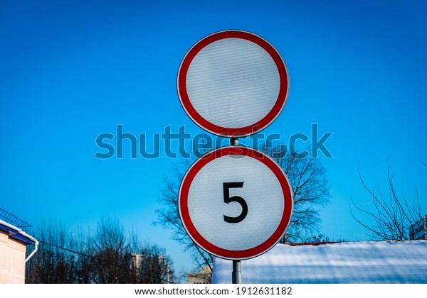 Restriction of movement sign, no entry signor\
no drive sing on blu sky\
background
