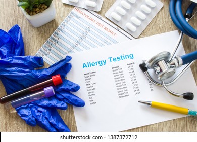 Result Of Allergy Testing On Working Table In Working Environment Of Doctor Of Internal Medicine, Allergologist, General Practice, Pediatrician Top View Top-down Photo Surrounded By Stethoscope, Drugs