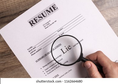 Resume close-up. The concept of false information about yourself when applying for a job, when writing a resume. Lies and deceit concept