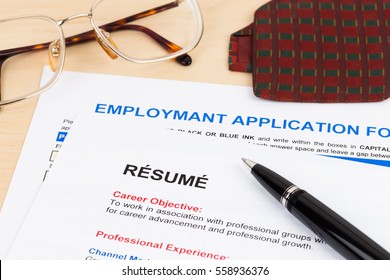 Resume And Employment Application Form With Glasses And Neck Tie