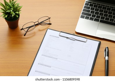 resume on table Office Business - Shutterstock ID 1106809598