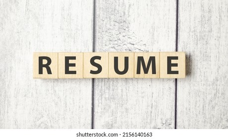 Resume Word On The Wooden Cube And White Wooden Background