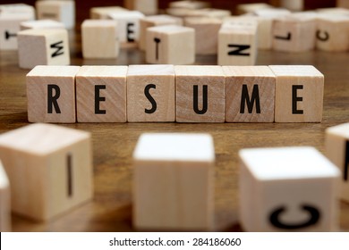 Resume Word Written On Wood Block