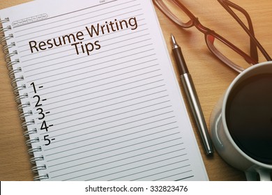 Resume Writing Tips Written On Notebook - Business Conceptual