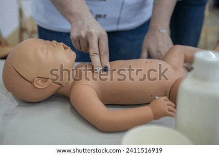 Resuscitating of the child , first aid , Cpr, first aid and healthcare with hands on chest of person for paramedic, medical and saving lives. Cardiac arrest, heart and injury with patient and compres
