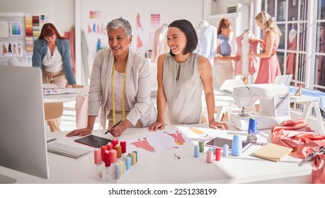 Retail, fashion and boutique owners on a computer for online shopping, ecommerce and delivery orders. Partnership, colleagues and business woman excited about online store startup at design studio - Powered by Shutterstock