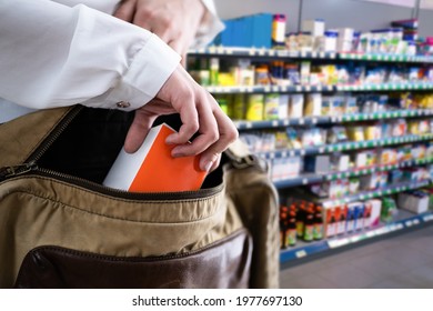 Retail Shoplifting. Woman Stealing In Supermarket. Theft At Shop