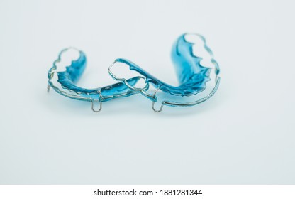 Retainer healthcare medical teeth mouth. Retainer blue on a white background. - Shutterstock ID 1881281344