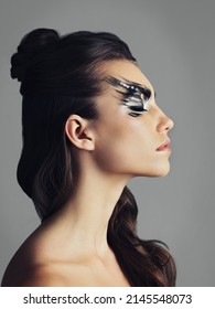 Rethink Makeup As A Tool For Creativity. Studio Shot Of An Attractive Young Woman Wearing Bold Eye Makeup.