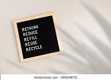 Rethink, reduce, refill, reuse, recycle. Black letter box with eco friendly motivational quote. Zero waste sustainable lifestyle. Plastic free concept. Flatlay, top view, copy space