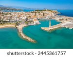 Rethymno city at Crete island in Greece. Aerial view of the old venetian harbor and Venetian Fortezza Castle