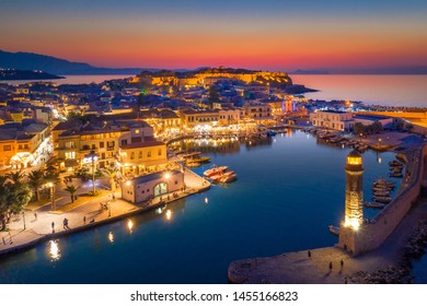 Rethymno City At Crete Island In Greece. Aerial View Of The Old Venetian Harbor.