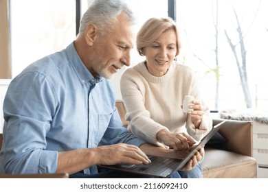 Retired Couple Looking For Prescription Pills On Internet. Online Shopping. Process Of Remote Consulting With Doctor. Buying Medicines Online On Laptop