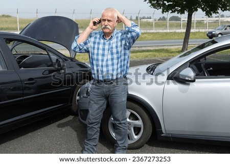 retired man desperate on the phone after trafic accident