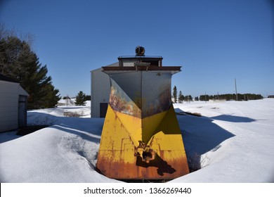 A Retired Plow Train Sits Idle At The Rails