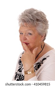 A Retired Senior Woman Looking At The Camera In A Sceptical Look, Can Not
Belief, Isolated For White Background.
