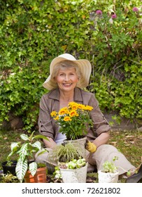 Retired Woman Working In The Garden