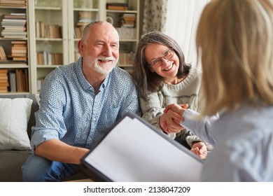 Retirement Advisor And Senior Couple Handshaking After A Consultation About Care And Retirement Planning