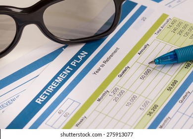 Retirement Planning With Glasses And Pen, Business Concept