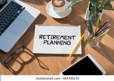 Retirement planning open book on table and coffee Business - Shutterstock ID 444704170