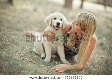 Similar – Image, Stock Photo Happy smiling dog with its pretty young owner