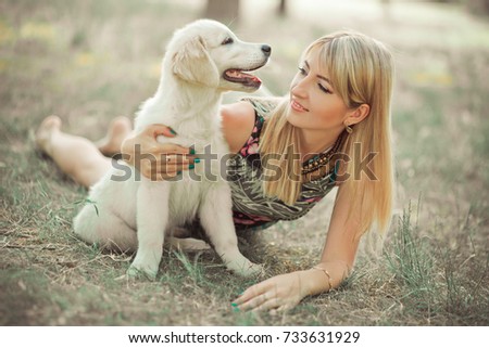 Similar – Image, Stock Photo Happy smiling dog with its pretty young owner