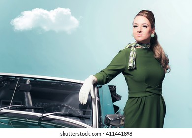 Retro 1960s Woman In Green Dress Standing Next Sportscar.