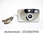 Retro 35mm film point and shoot compact snapshot autofocus camera, retro gadget 1990s front view