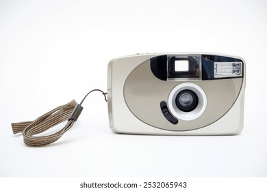 Retro 35mm film point and shoot compact snapshot autofocus camera, retro gadget 1990s front view - Powered by Shutterstock