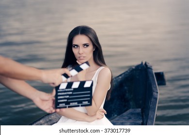 Retro Actress Shooting Movie Scene in a Boat - Young professional cinema star acting in a film
