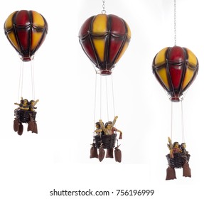 Retro Air Balloon With Four People (dolls) In Basket With Sandbags 