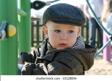 Retro Baby. 18 Months Old Baby Boy And Cloth Cap.