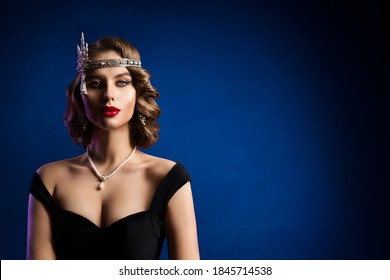 Retro Beautiful Flapper Woman, Vintage Wave Hairstyle, Makeup, Red Lips, Glamour Model Old Fashioned Portrait over Blue Background