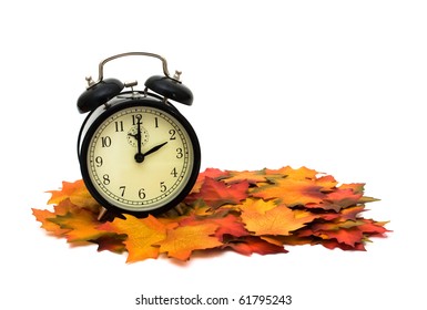 Retro Black Alarm Clock On Fall Leaves, Fall Time Change