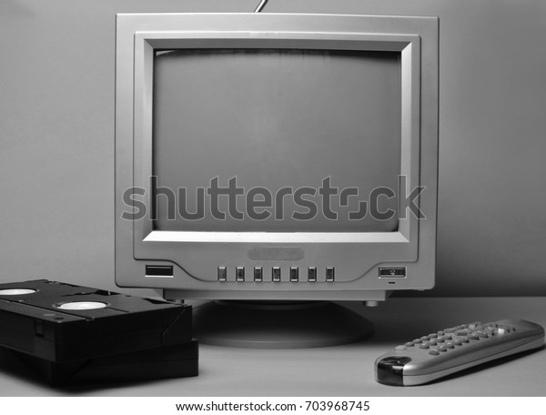 Retro black and white TV close-up.\
Front view of the screen. Vintage media\
technologies.