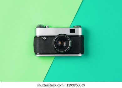retro camera on color pastel background