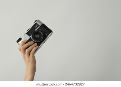 Retro camera, photo shooting on retro camera - Powered by Shutterstock